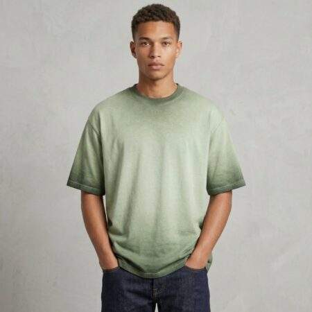 wingslabel plain oversized sun faded green tshirt half front pose.jpg