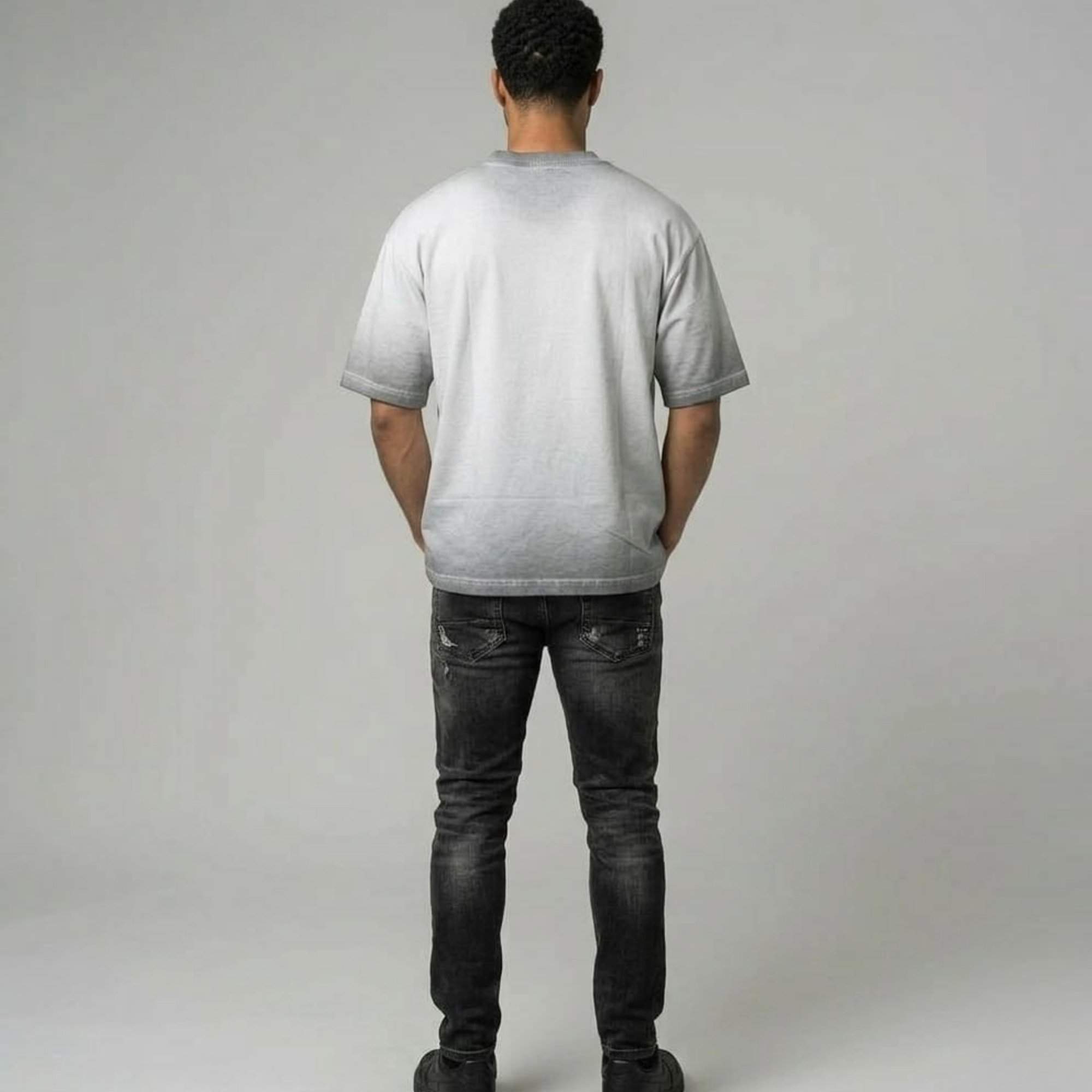 wingslabel plain oversized sun faded white grey tshirt back pose.jpg wingslabel plain oversized sun faded white grey tshirt back pose.jpg